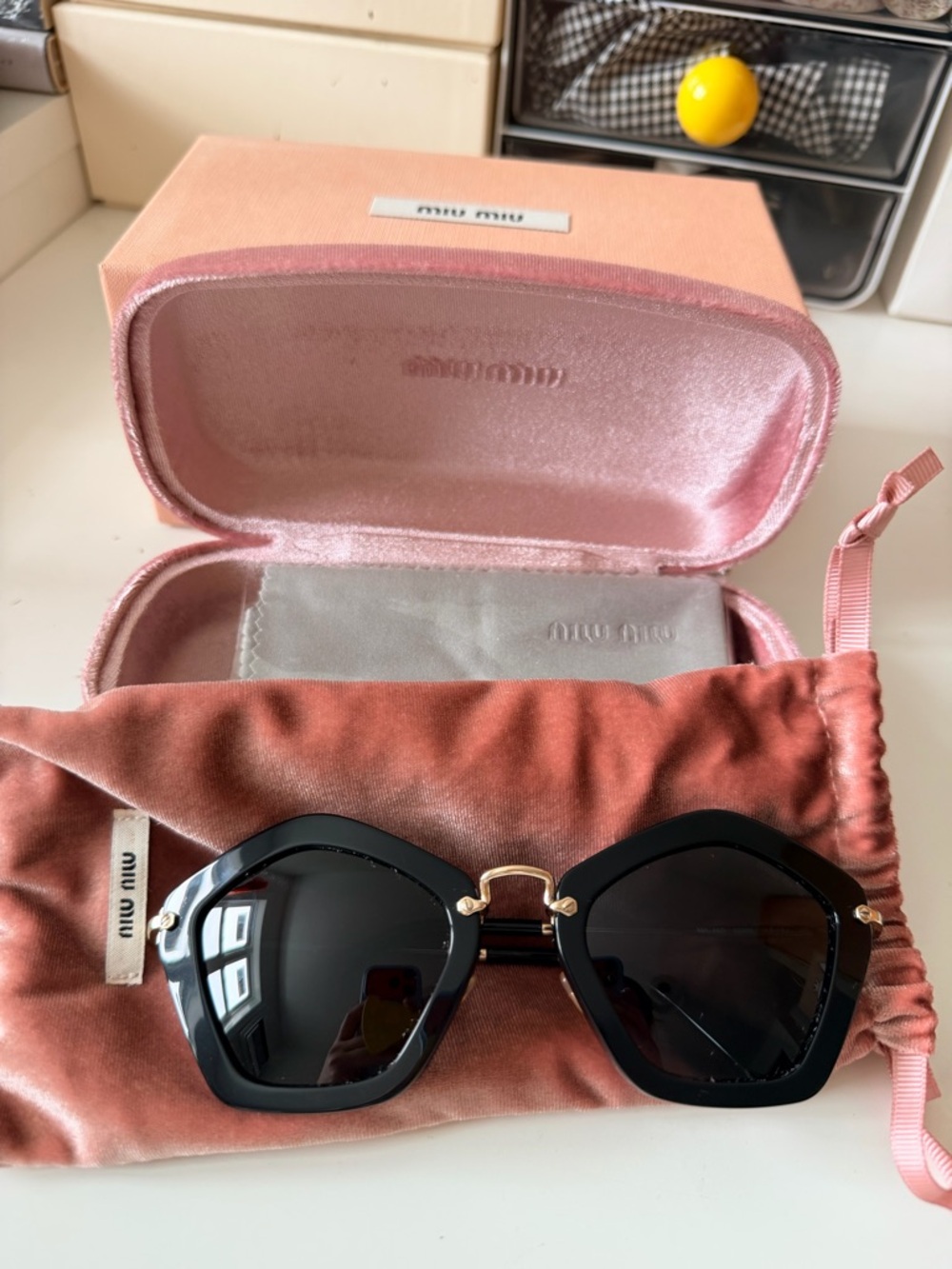 Miu Miu Black Geometric Sunglasses with Gold Bridge